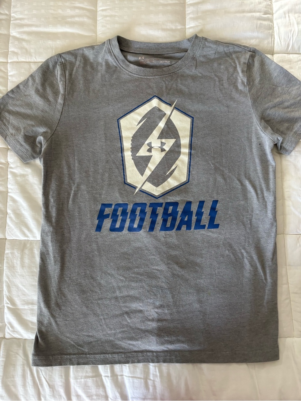 Under Armour Gray Tee with Blue Football Shield Graphic